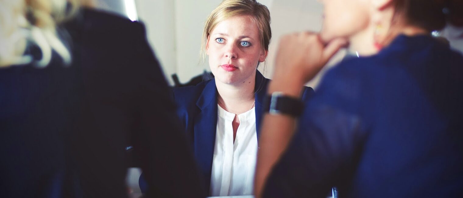 3 Women in Suit Sitting